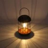 Solarlaterne 'Lighthouse', Schwarz, Metall, Höhe 26 Cm -Die grüne Ecke 2950100609 Solar Metall Tischlampe Modell Lighthous 1 96754